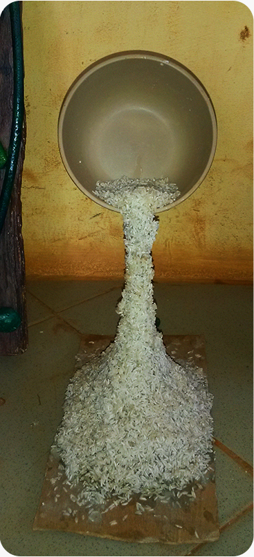 A pouring rice monument